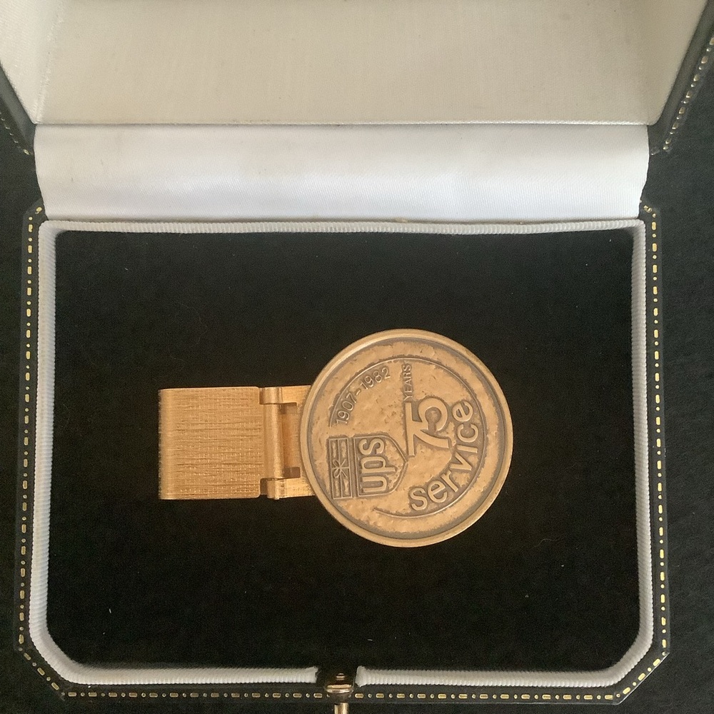Vintage UPS 75years service money clip.